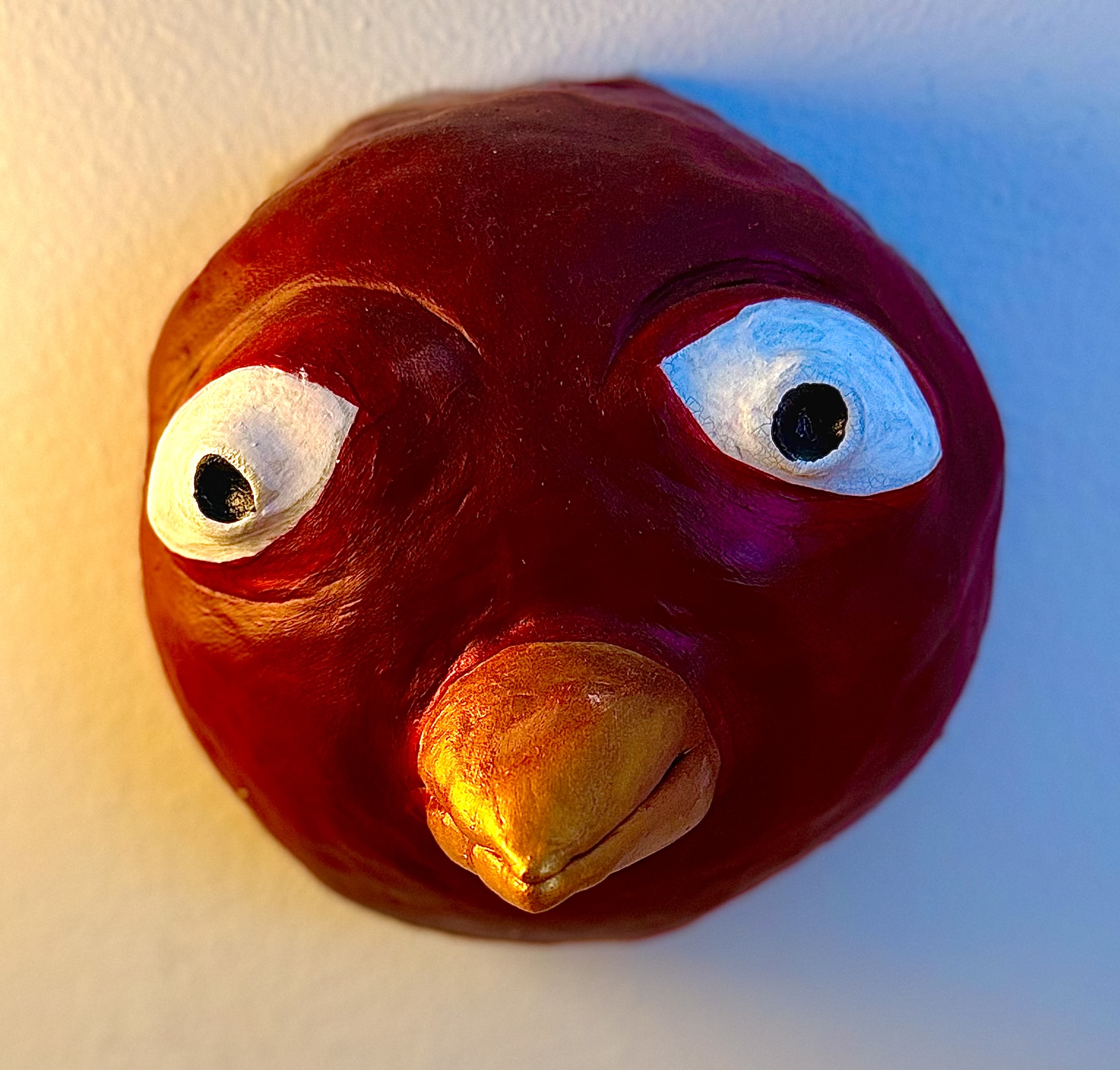 Rødt fuglehoved.